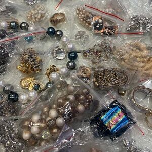Bag of vintage jewelry